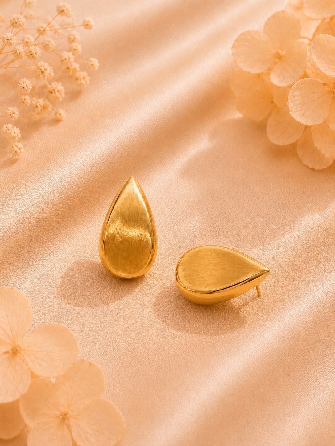 7.A Mrigaya Golden Dewdrop Earrings for Women