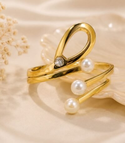 Golden Spark Pearl Loop Statement Bangle